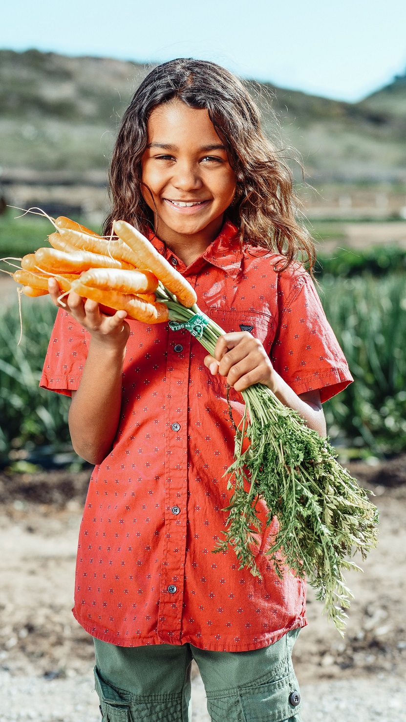 Girl With Carrots